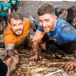 Two muddy men